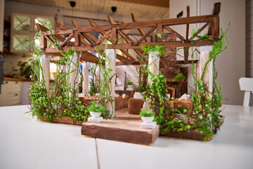 Architectural project, realistic model of a summer gazebo with columns and a roof made of wooden beams in beige colors