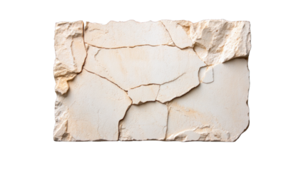 A large white stone with cracks and holes in it