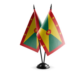 Small national flags of the Grenada on a white background