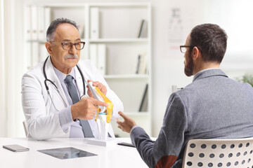Doctor and patient sitting in an office and talking