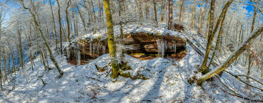 Dahner Felsenland after rainy days frost comes and with it many icicles that grow on the various rocks, fascinating shapes and structures