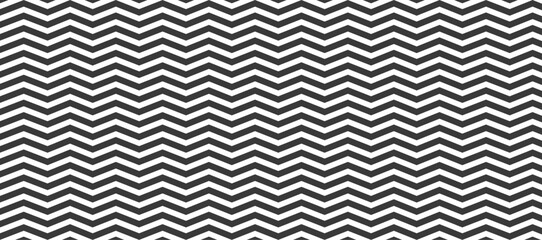 Regular black and white zigzag chevron pattern with seamless zigzag line texture. Abstract geometric background for textiles, wallpapers, and modern designs.
