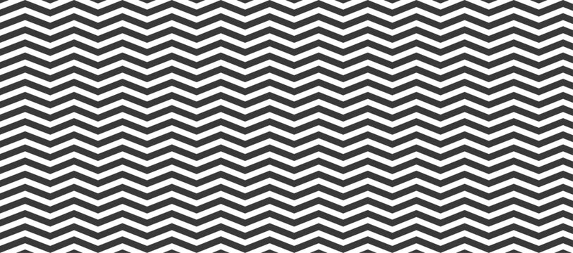 Regular black and white zigzag chevron pattern with seamless zigzag line texture. Abstract geometric background for textiles, wallpapers, and modern designs.