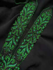 Gerdan with a black and green beaded ornament. Ethnic-style necklace with beads