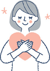 両手で大切そうにハートを抱く女性