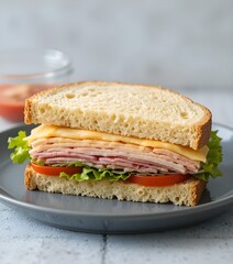 Healthy Whole Grain Club Sandwich with Ham  Cheese  Lettuce  and Tomato  A Nutritious and Delicious Meal 