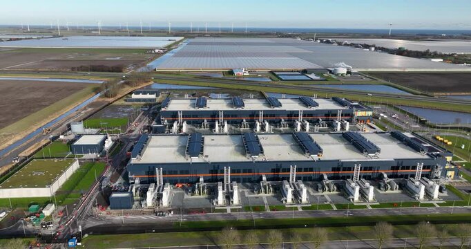 Hyperscaler, data center, global computing, massive workloads, infrastructure for modern cloud computing. Aerial drone view.