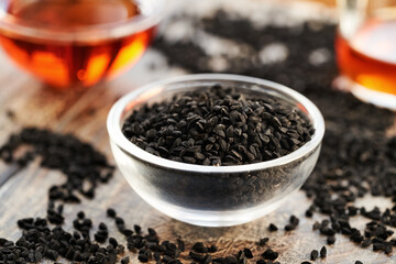 Black cumin or Nigella sativa seed and oil. Nutritional supplement.