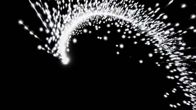 White Particles Explosion. Motion Background. Xmas glitter particle. Isolated on black