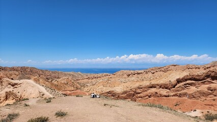 Scenic View of Fary Tale  Canyon, Issyk-Kul, Kyrgyzstan- Stunning Red Rock Formations.