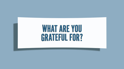 What are you grateful for. A card isolated on blue background.