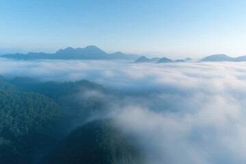 Obraz premium mountains and fog in the morning, aerial view