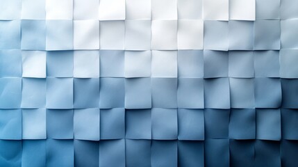 Varied shades of blue paper squares create an abstract texture
