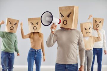 Angry protesting crowd. Disappointed frustrated dissatisfied anonymous adult people with megaphone...