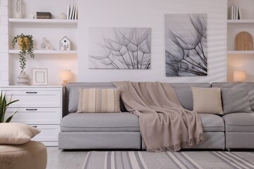 Modern living room interior. Comfortable sofa and other furniture indoors