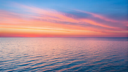 Obraz premium Panoramic sunset over calm waters serene coastal scene nature landscape tranquil environment