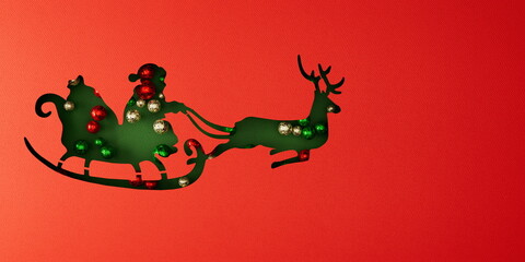 paper cut Green Santa Sleigh and Reindeer with Christmas Ornaments on Red Background