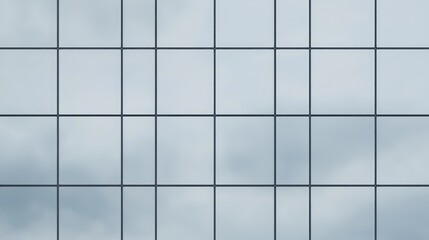 Cloudy sky reflected in modern building facade