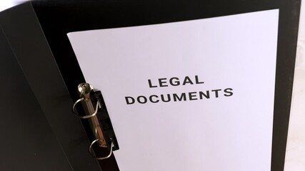 Important legal documents organized in a folder for review