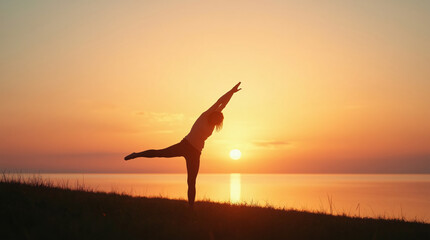 Silhouette of yoga pose, golden sunset over calm water, serene lakeside, warm orange glow, peaceful atmosphere, grassy shoreline, reflective water, elongated shadow, graceful balance