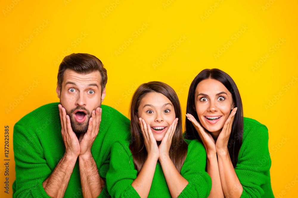 Poster Photo of funny cheerful amazed stupor family mommy daddy excited crazy with shopping mall starting x-mas sales wearing red sweaters isolated over vivid color yellow background