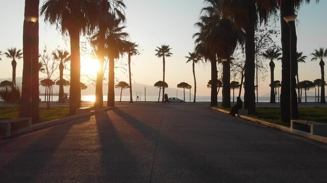 Vlora, albania at sunset with urban landscape and surrounding hills in the distance, aerial view