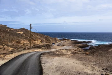 Road in sunny day to Saint Michael of Tajao, Spain  