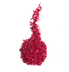 dried raspberries in granules on a white background