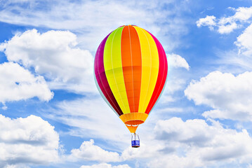 Fototapeta premium Colorful hot air balloon flying over blue sky with white clouds 