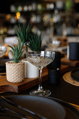 Black color Luxury table elegant set for an event party or wedding reception.