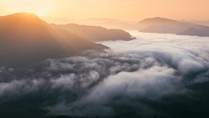 Aerial photography of beautiful countryside with morning mist and sea of clouds