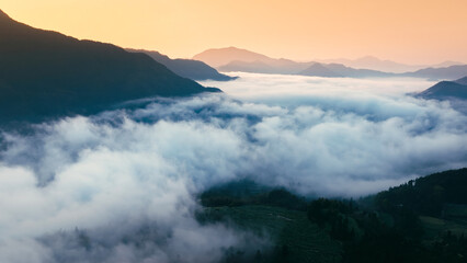 Aerial photography of beautiful countryside with morning mist and sea of clouds