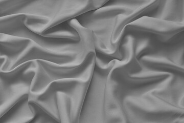 Obraz premium A black and white crumpled texture fabric background. Close up.