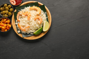 Pieces of banana leaf with rice and shrimps among other food on grey textured table, flat lay. Space for text