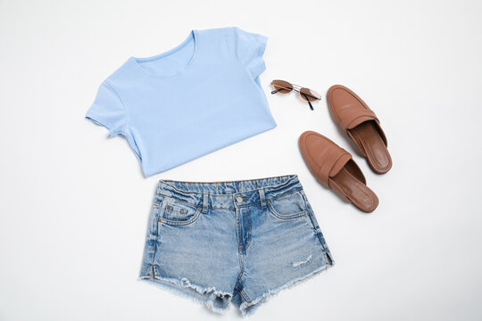 Stylish clothes, shoes and sunglasses on white background, flat lay