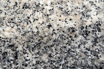 Speckled granite texture with polished natural stone pattern. Classic architectural and interior...