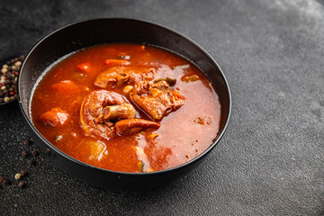 Tomato soup meat vegetable goulash fresh tasty food dish gourmet food background on the table rustic food top view copy space