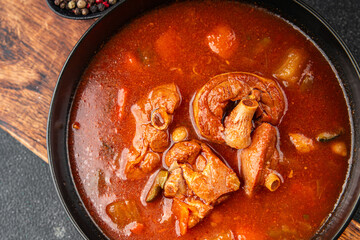 Tomato soup meat vegetable goulash fresh tasty food dish gourmet food background on the table rustic food top view copy space