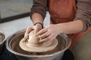 Hobby and craft. Woman making pottery indoors, closeup