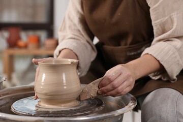 Hobby and craft. Woman making pottery indoors, closeup