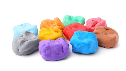 Different colorful play dough isolated on white