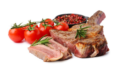 Pieces of delicious beef meat, spices and tomatoes isolated on white