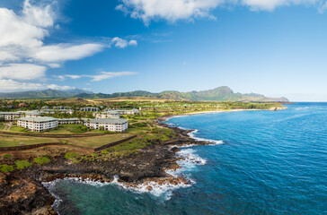 Aerial view of Keoniloa Bay and Shipwreck beach in Koloa on south coast of Kauai