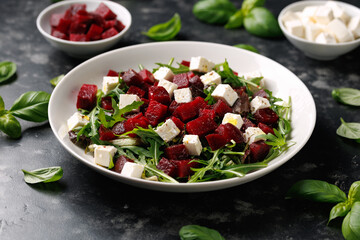 Fresh Beetroot feta salad with wild rocket and lemon dressing. Healthy food.
