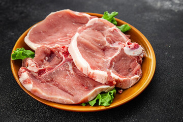 Raw pork on bones meat fresh tasty food dish delicious gourmet food background on the table rustic food top view copy space