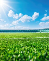 A vibrant stadium field under a bright sky, showcasing lush green grass and fluffy clouds, perfect for sporting events.