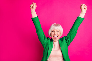 Portrait of her she nice attractive cheerful cheery overjoyed gray-haired lady wearing blue green...