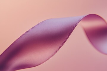 Flowing Purple Satin Ribbon on Soft Light Pink Background
