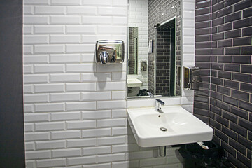 stylish contrasting monochrome interior of bathroom and toilet room