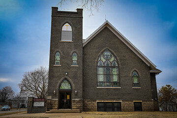 small down church on street corner